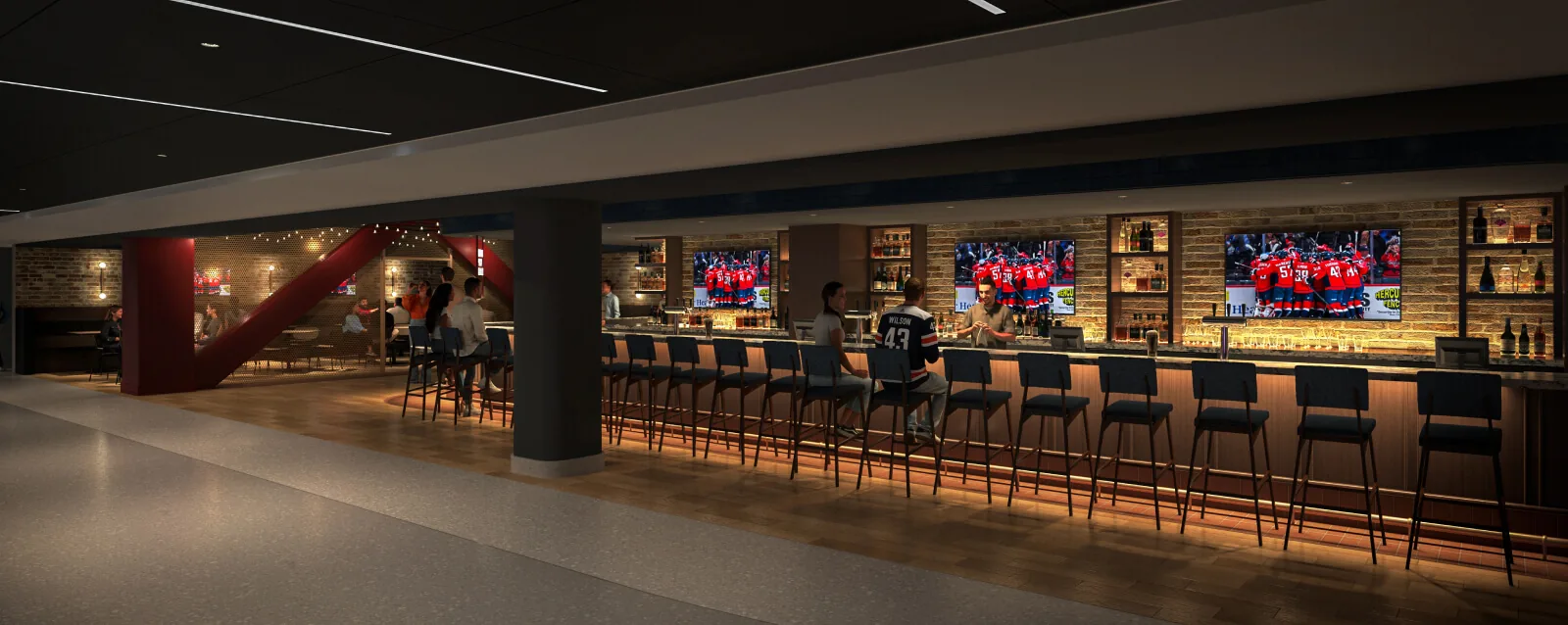 North Beer Hall seating area with large televisions and direct sightlines to the event